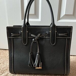 Dooney & Bourke leather handbag with taupe stitching.